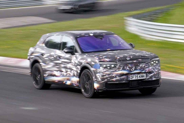 Electric Bentley SUV with heavy camo spotted testing at Nürburgring